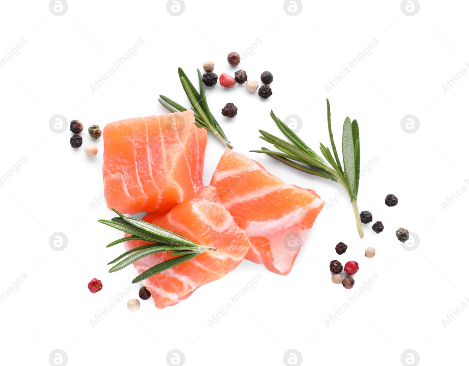 Photo of Pieces of fresh raw salmon and spices on white background, top view