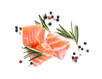 Pieces of fresh raw salmon and spices on white background, top view