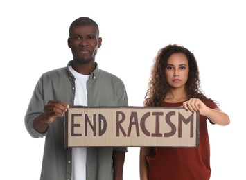 African American woman and man holding sign with phrase End Racism on white background