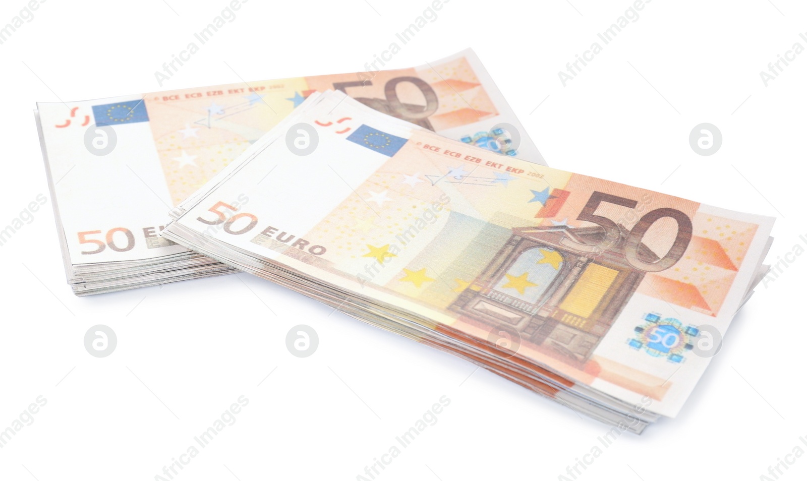 Photo of Stacks of euro banknotes isolated on white. Money and finance