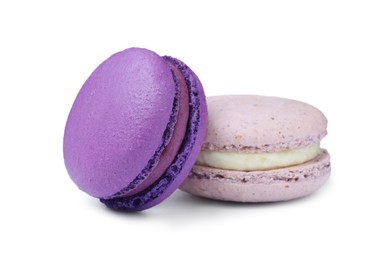 Photo of Different delicious colorful macarons on white background