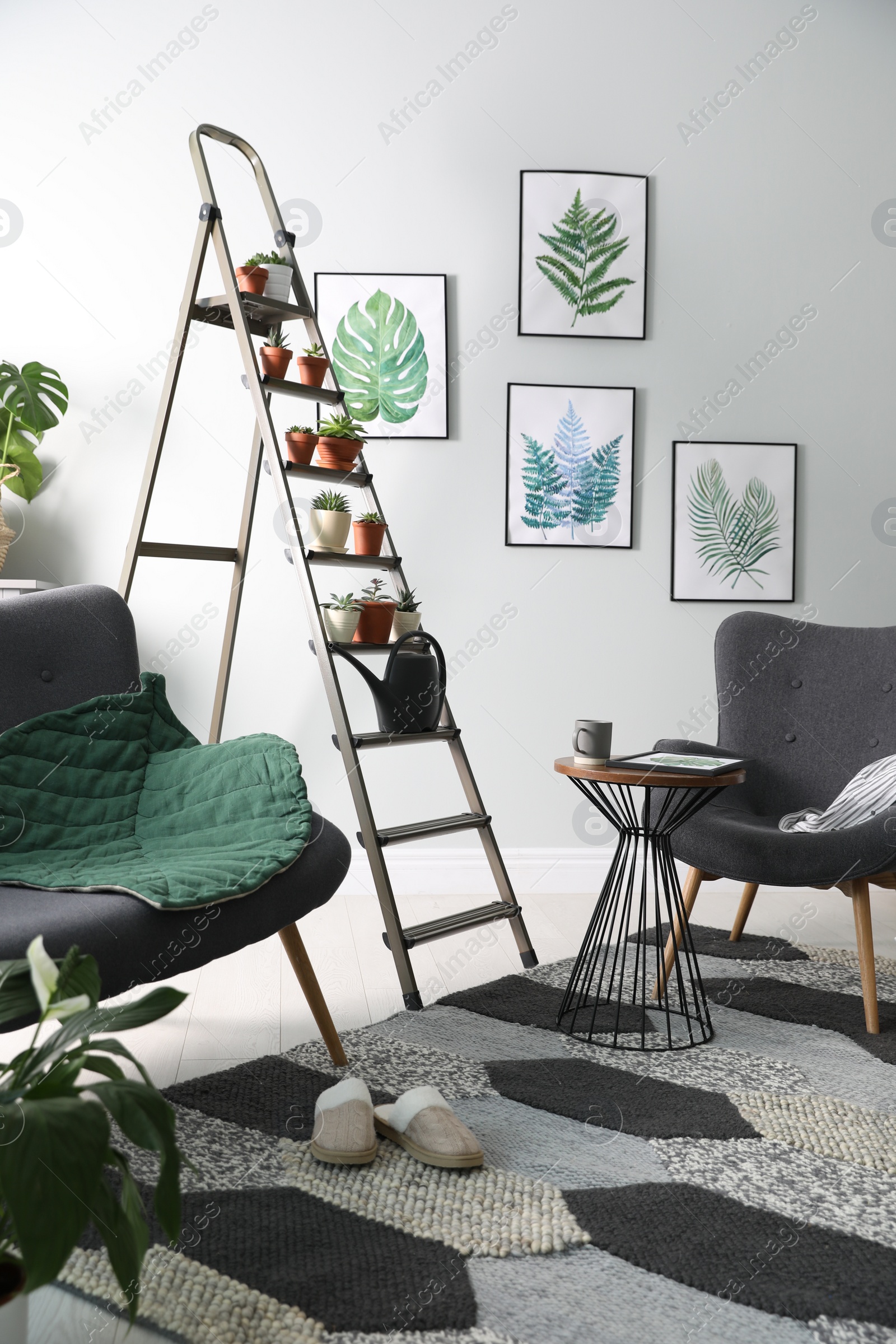 Photo of Stylish living room interior with decorative ladder