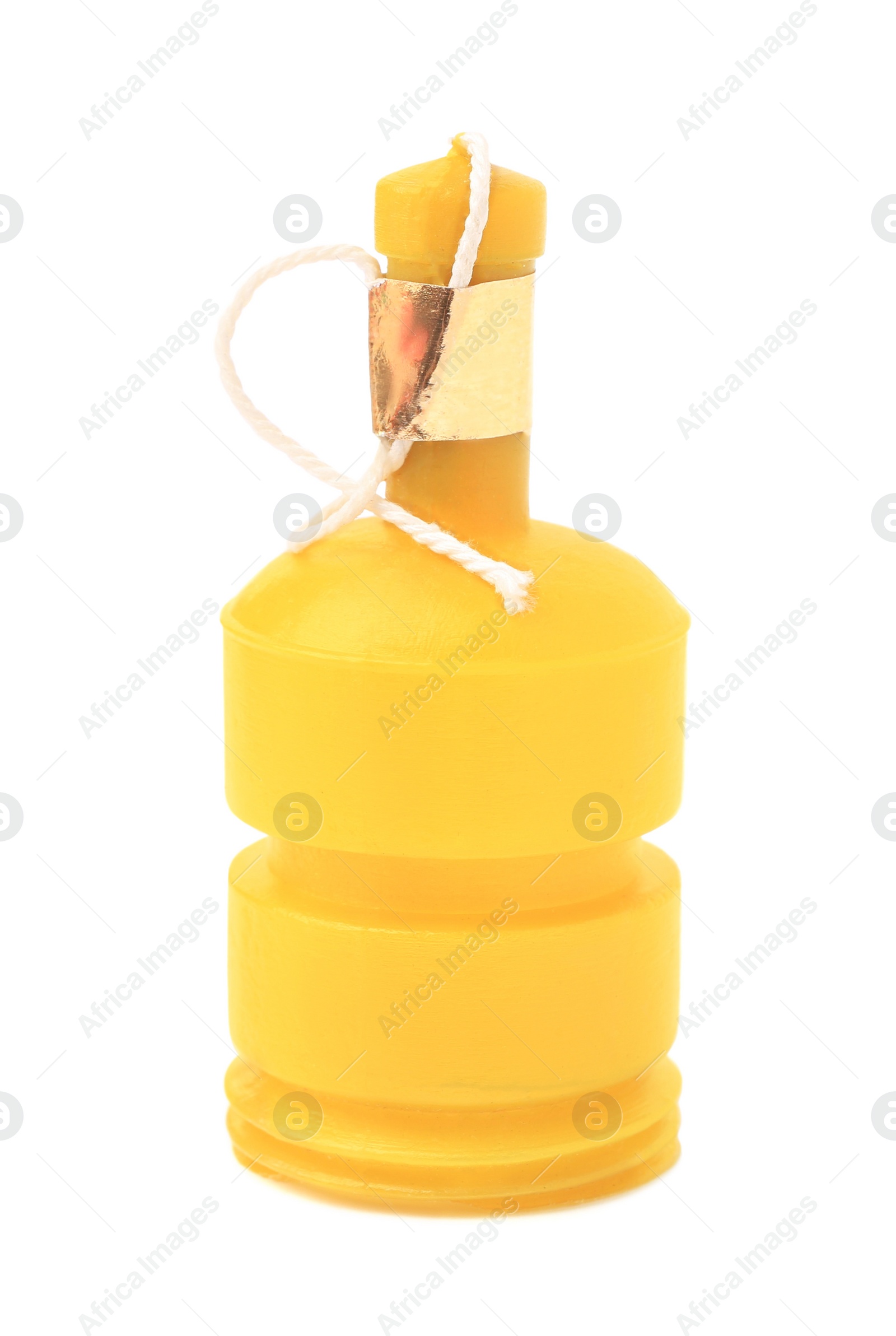 Photo of Yellow party cracker isolated on white. Bright decoration