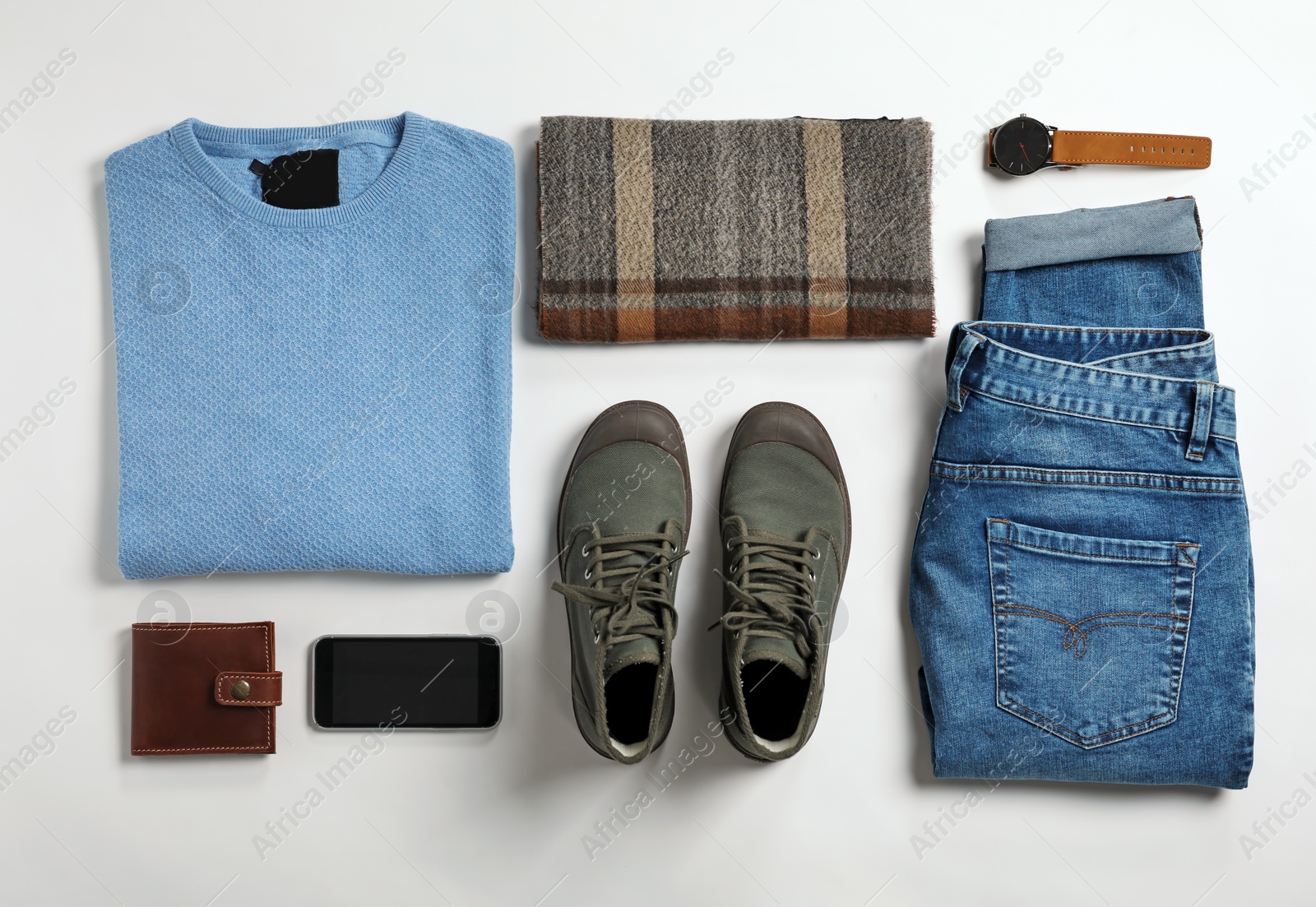 Photo of Flat lay composition with male winter clothes on white background