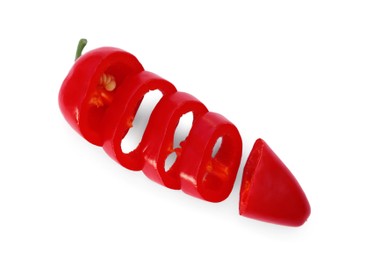 Photo of Cut red hot chili pepper isolated on white, top view