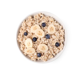 Tasty boiled oatmeal with blueberries and banana in bowl isolated on white, top view