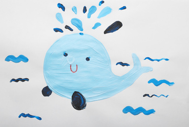 Photo of Child's painting of whale on white paper