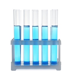 Photo of Test tubes with blue liquid on white background. Laboratory glassware