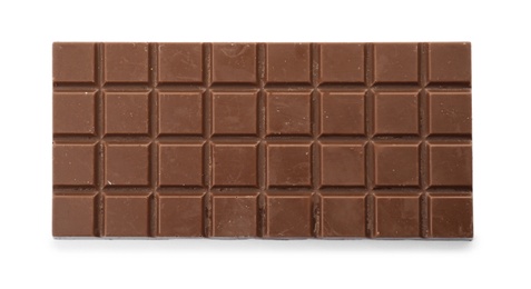Photo of Delicious milk chocolate bar on white background, top view