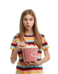 Photo of Emotional teenage girl with popcorn during cinema show on white background