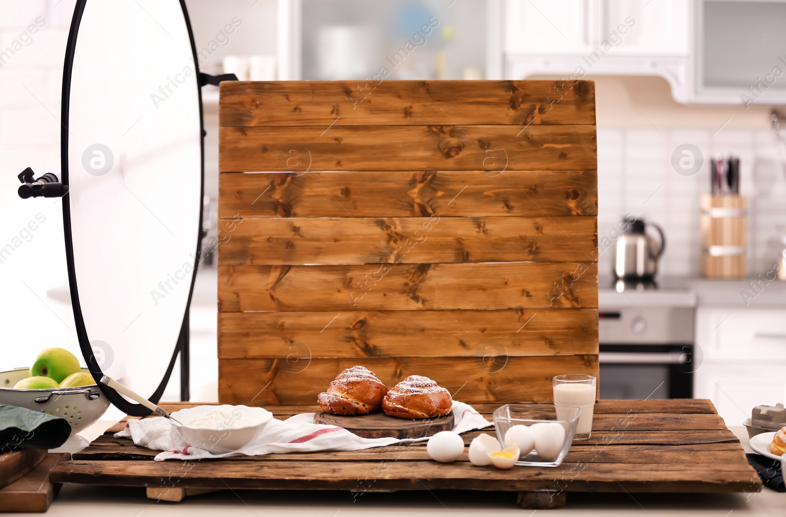 Photo of Professional photo equipment and food composition on table in studio