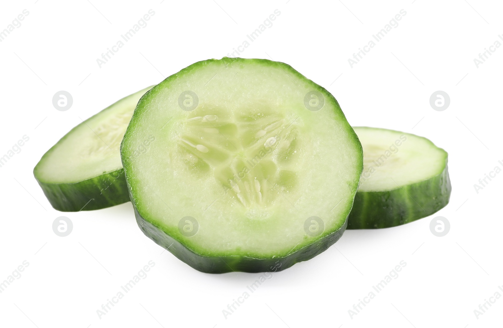 Photo of Slices of fresh cucumber isolated on white