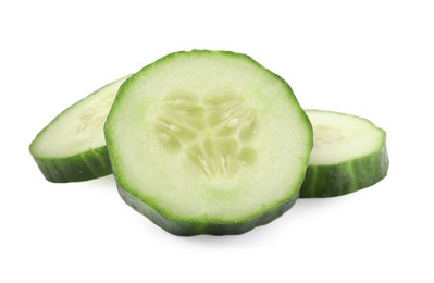 Photo of Slices of fresh cucumber isolated on white