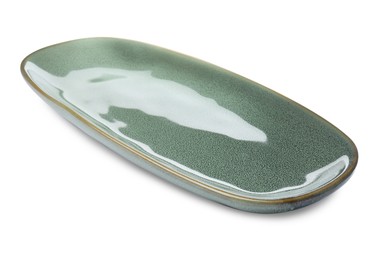 New green ceramic dish on white background