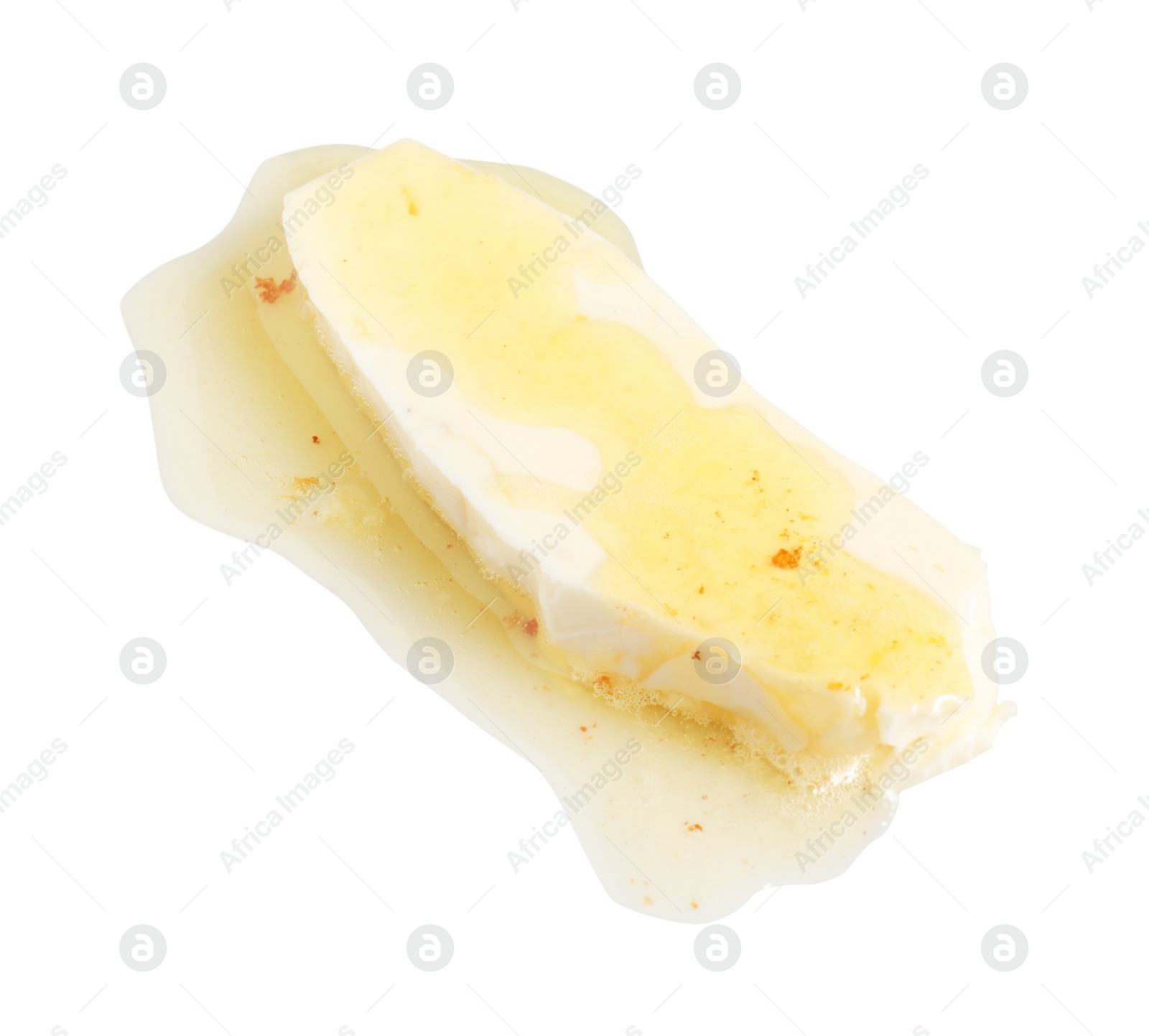 Photo of Piece of melting butter on white background