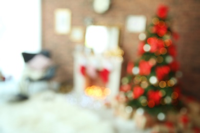 Photo of Blurred view of room with beautiful Christmas tree