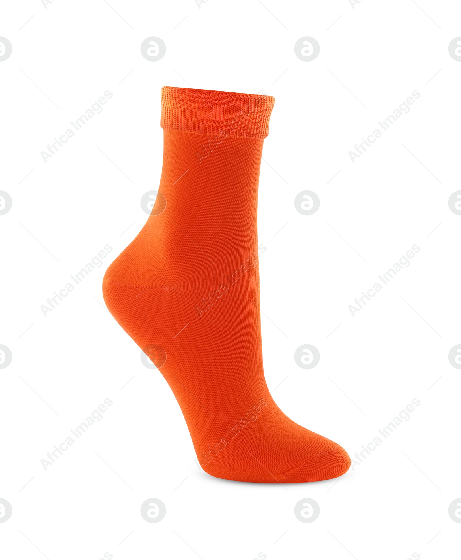 Photo of New orange sock isolated on white. Footwear accessory