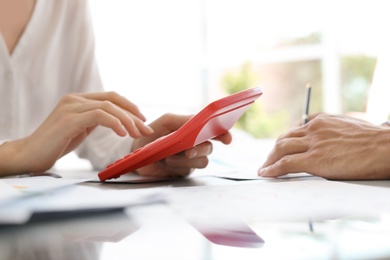 Photo of Tax accountants working with documents at table