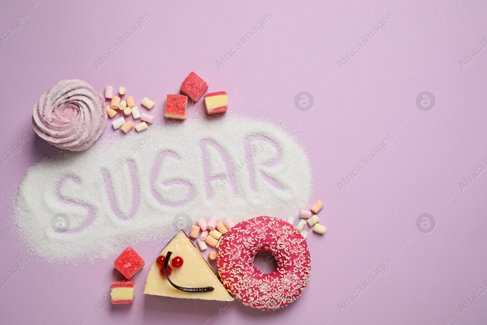 Photo of Flat lay composition with sweets and word SUGAR on lilac background