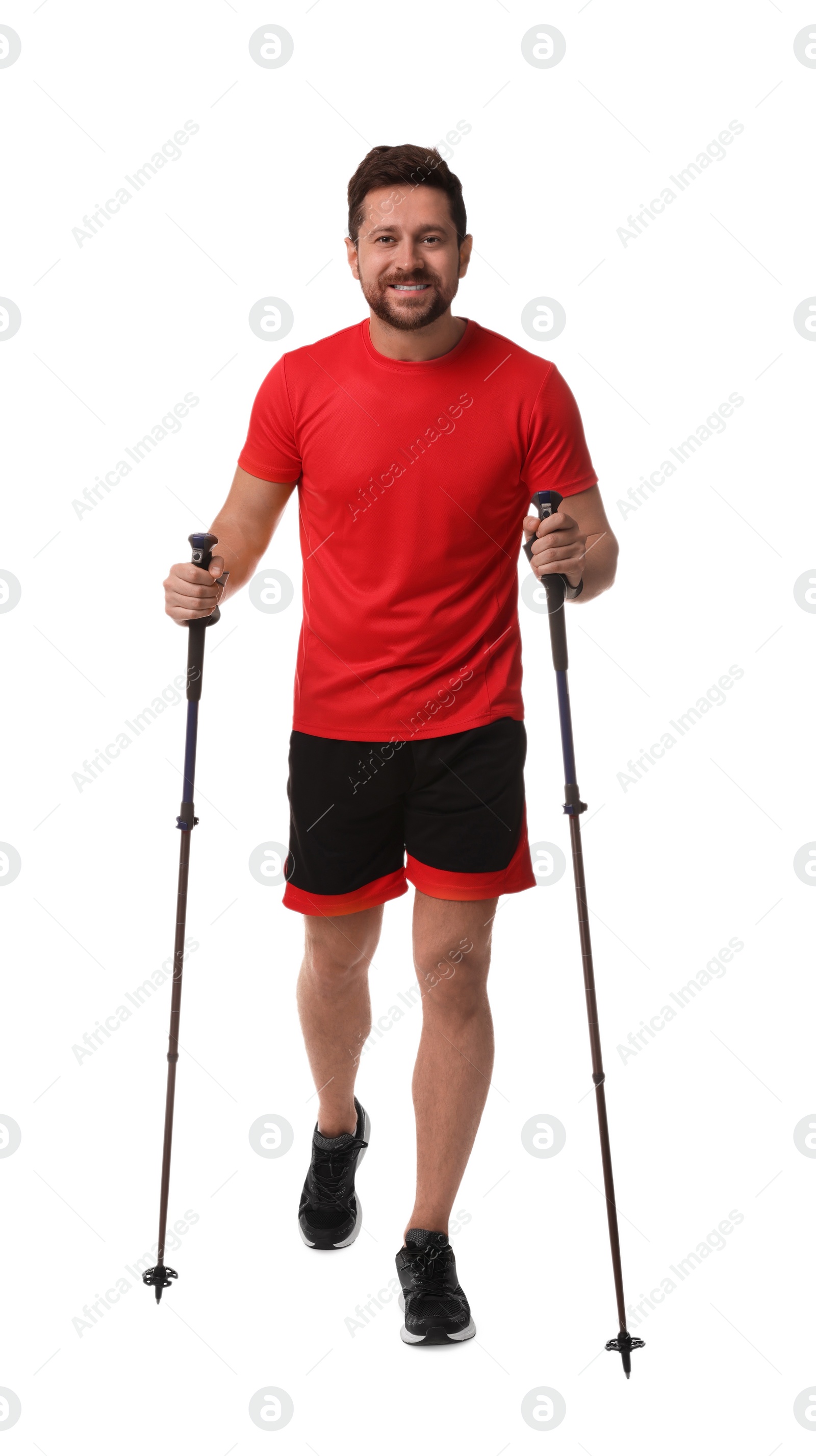 Photo of Man practicing Nordic walking with poles isolated on white