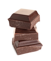 Photo of Pieces of tasty dark chocolate on white background