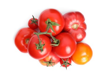 Many different ripe tomatoes on white background, top view