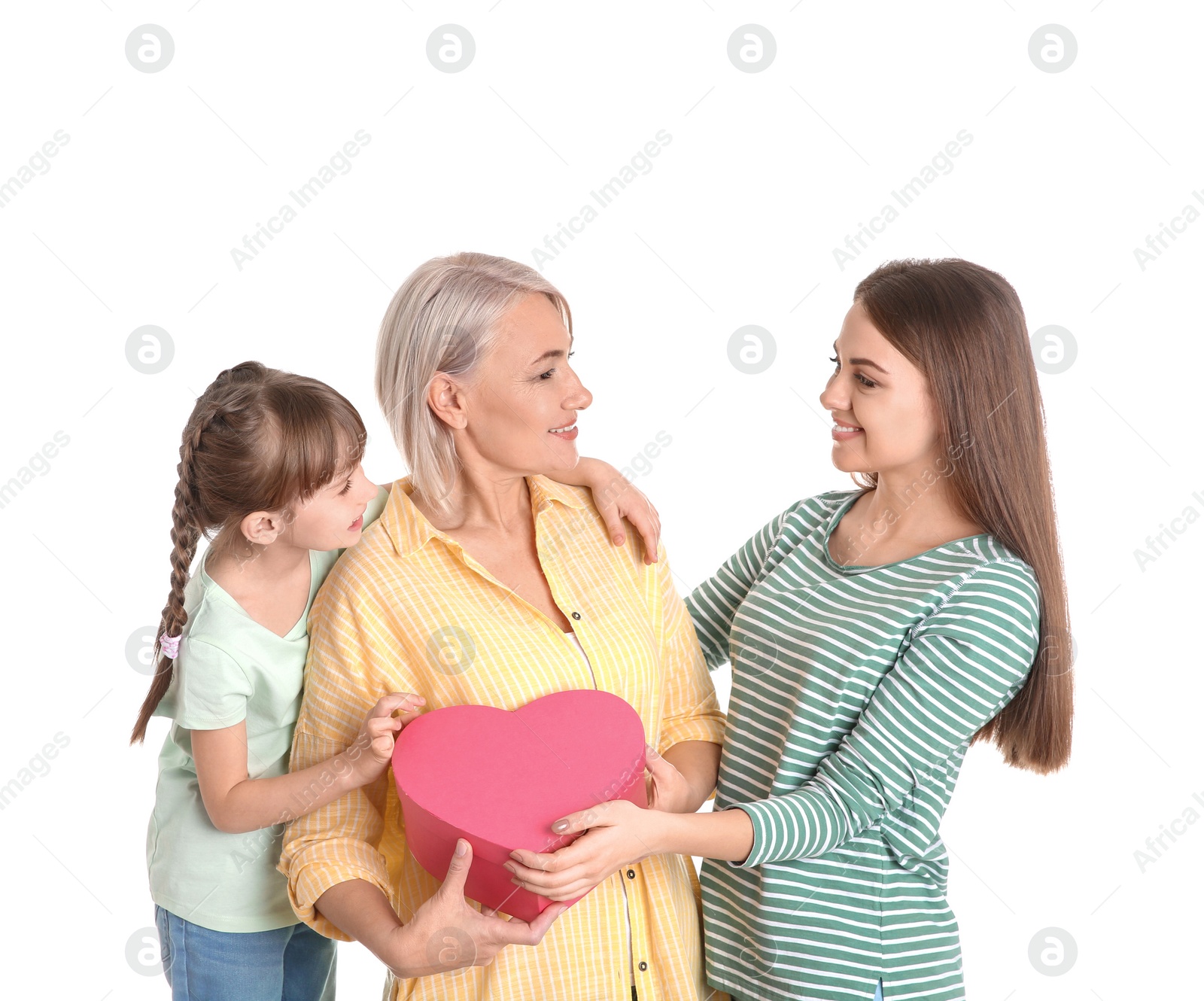 Photo of Beautiful mature lady, daughter and grandchild with gift box on white background. Happy Women's Day