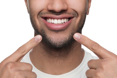 Photo of Man showing healthy gums on white background, closeup