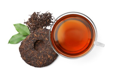 Traditional Chinese pu-erh tea, freshly brewed beverage and green leaves isolated on white, top view
