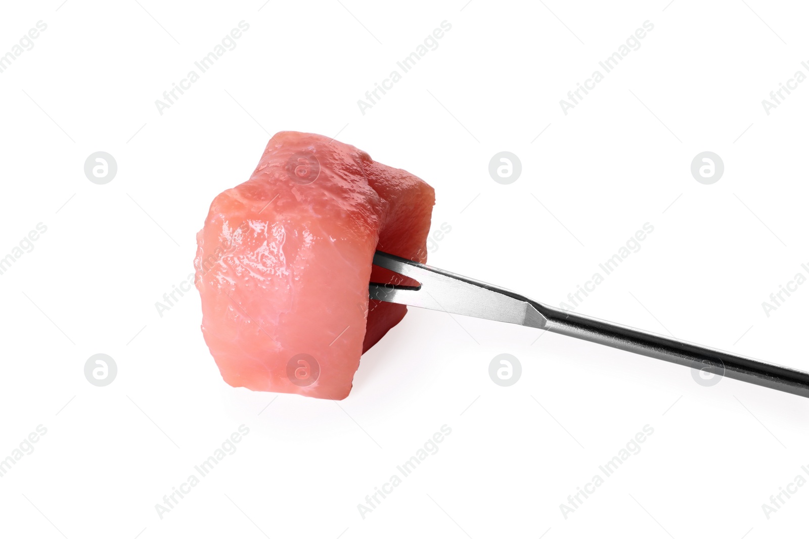 Photo of Fondue fork with piece of raw meat isolated on white