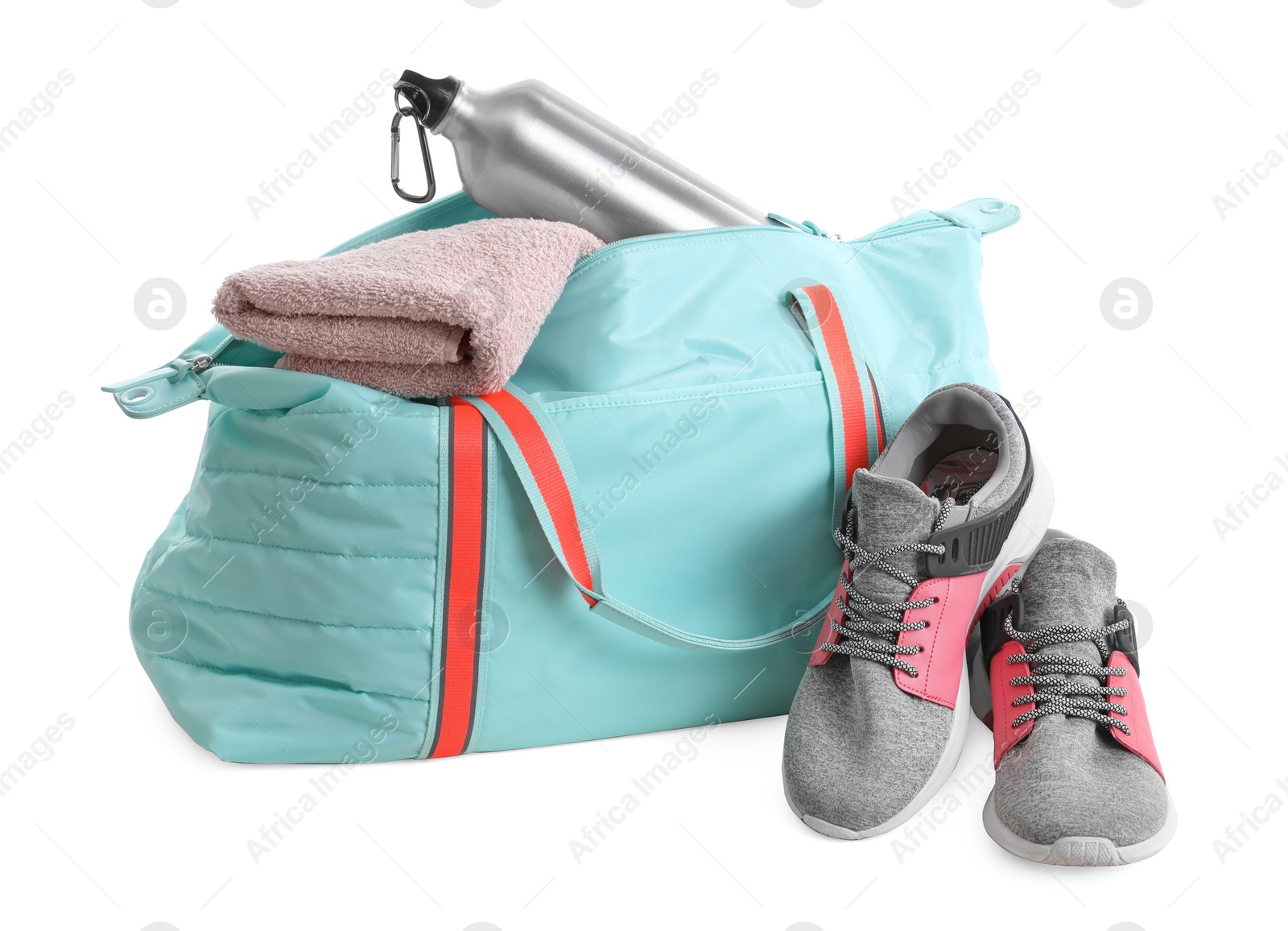 Photo of Sports bag with gym equipment on white background