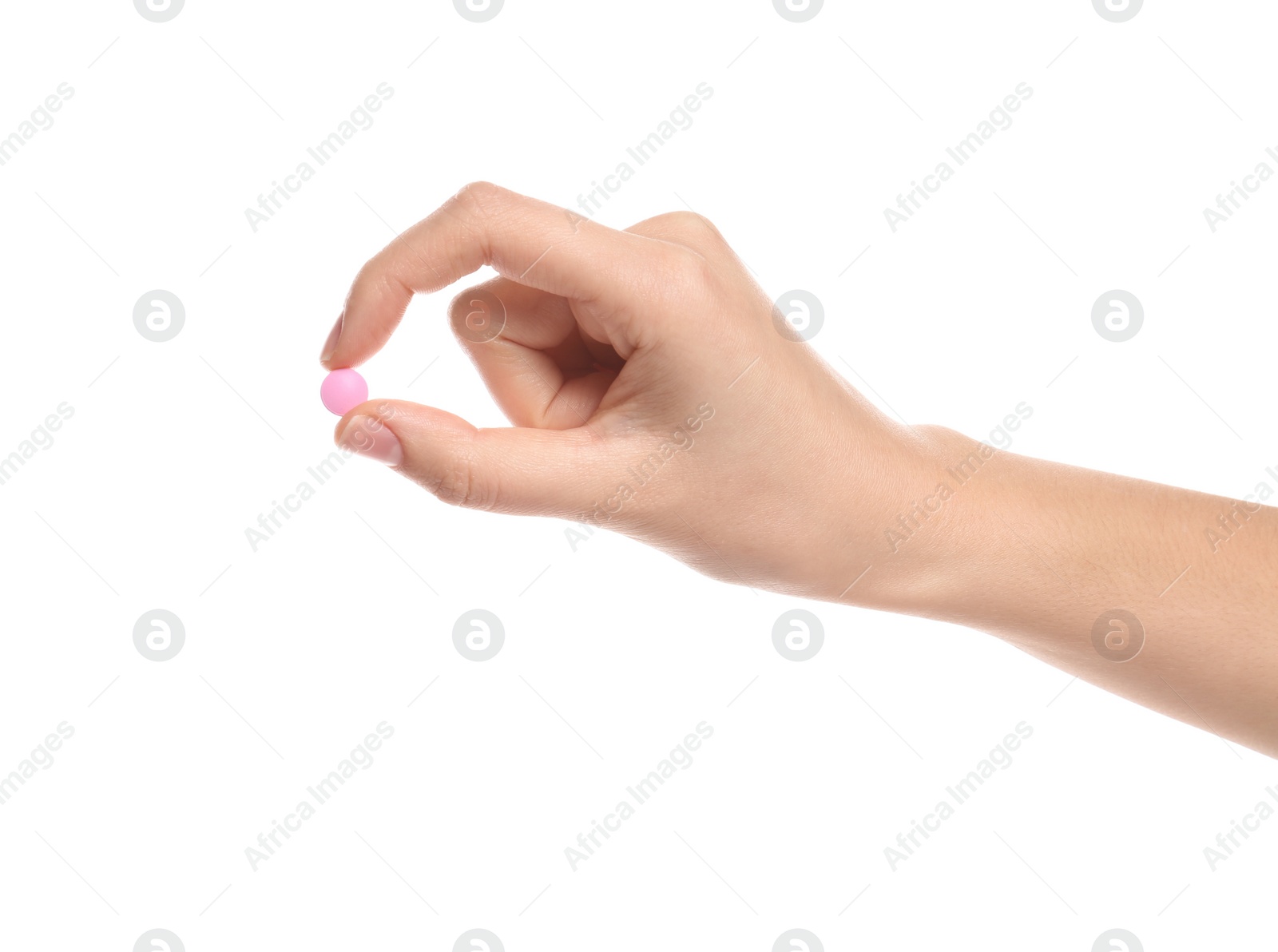 Photo of Woman holding color pill on white background, closeup