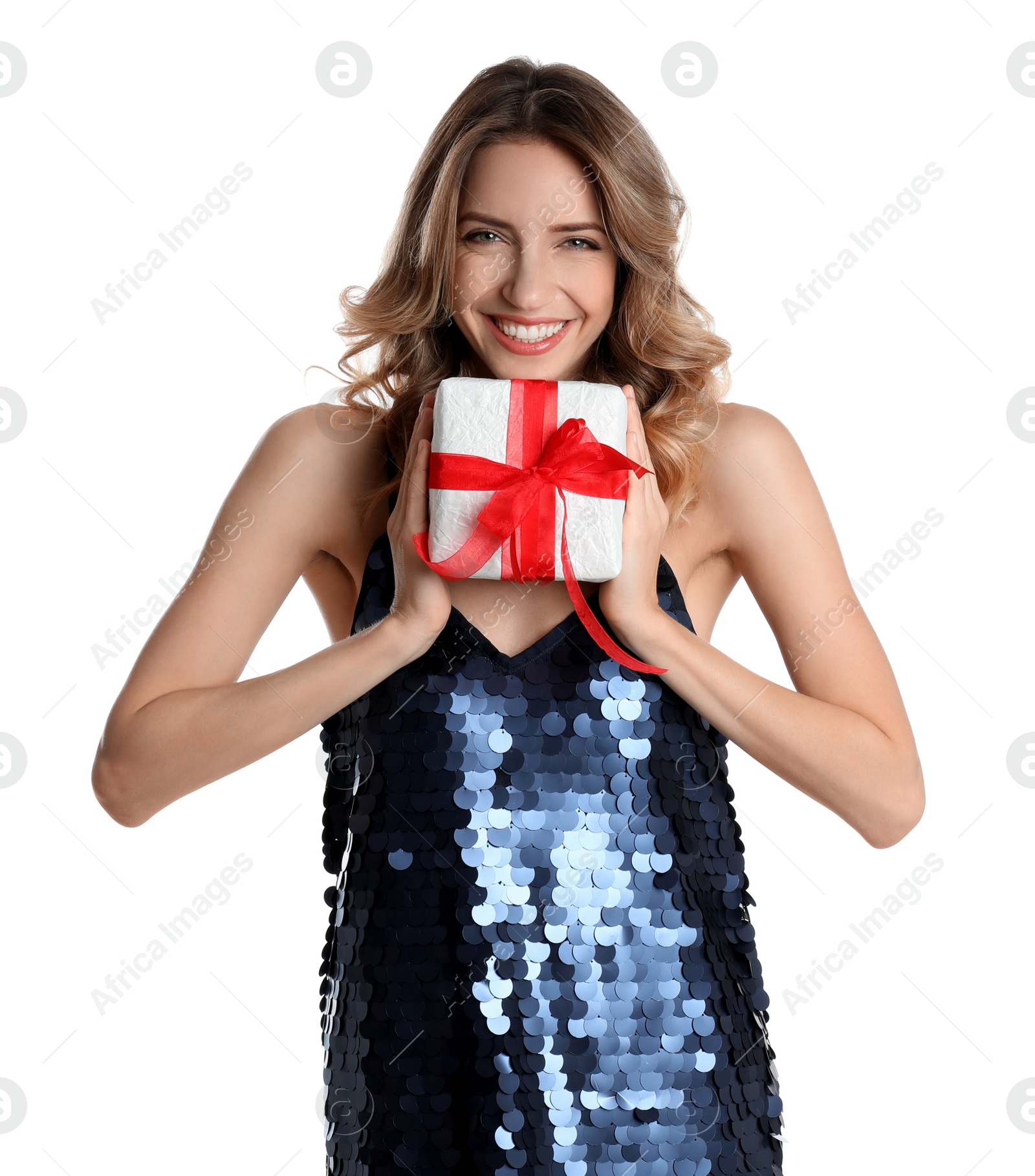 Photo of Beautiful young woman with Christmas present on white background