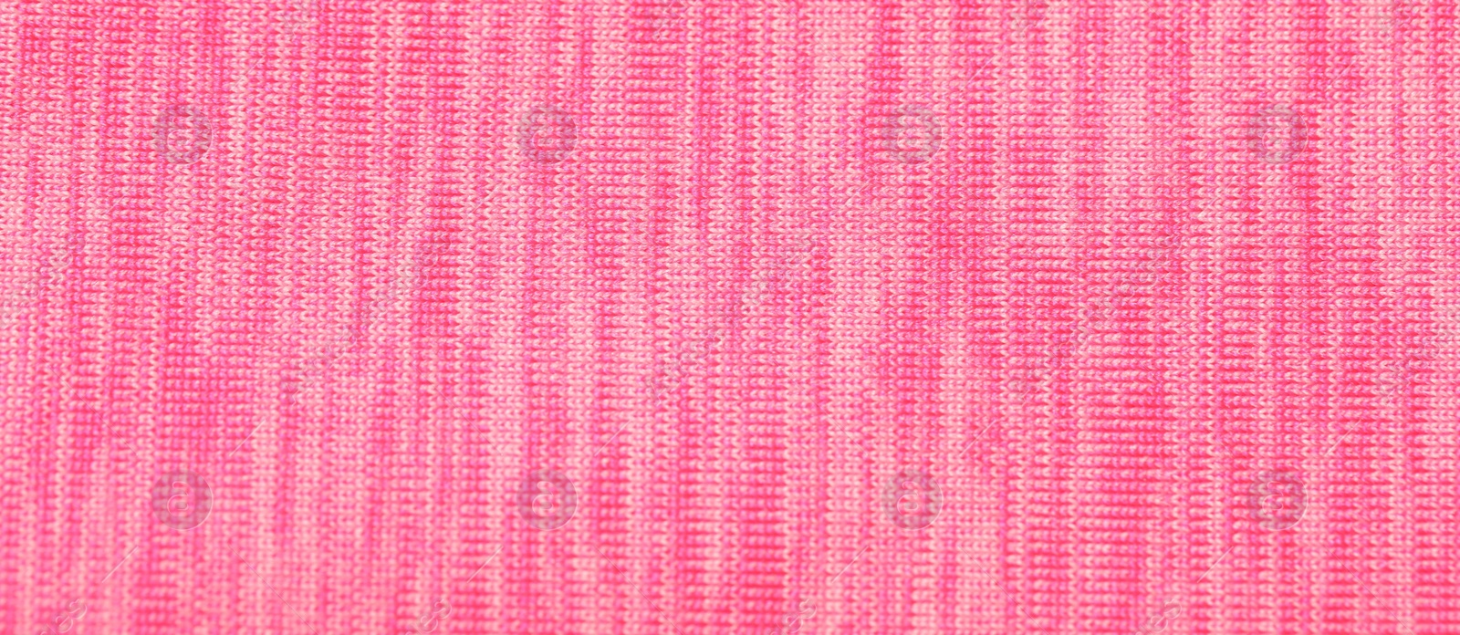 Photo of Texture of soft pink fabric as background, top view