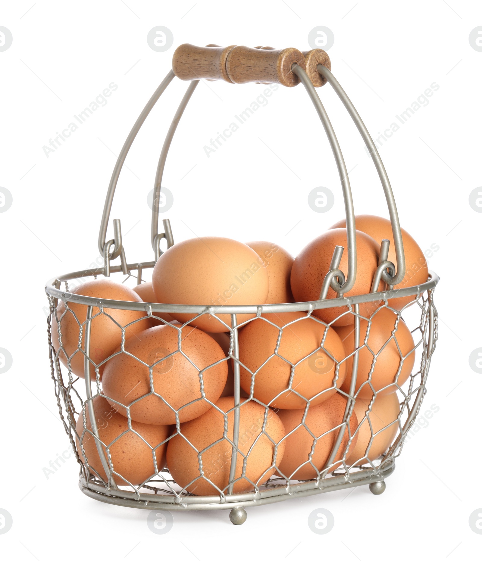 Photo of Chicken eggs in metal basket isolated on white