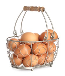 Photo of Chicken eggs in metal basket isolated on white