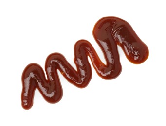 Photo of Sample of tasty barbecue sauce isolated on white, top view