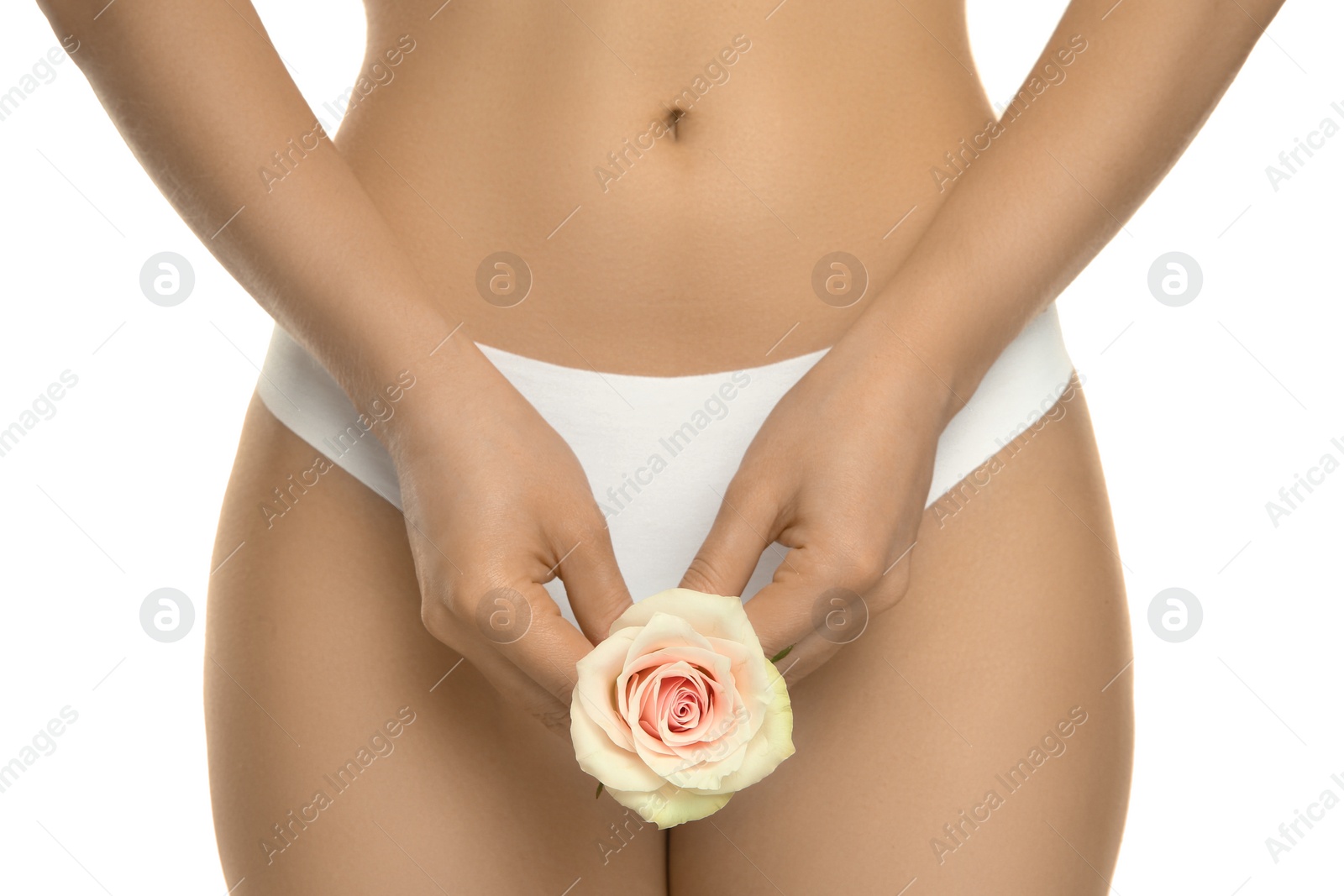 Photo of Gynecology. Woman in underwear with rose flower on white background, closeup