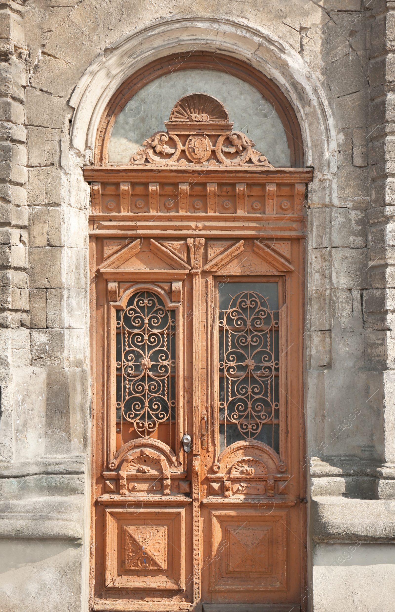 Photo of Big vintage wooden door of old building