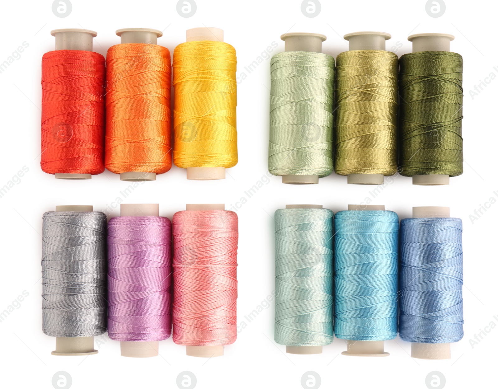 Photo of Set of colorful sewing threads on white background, top view