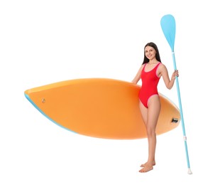 Photo of Happy woman with orange SUP board and paddle on white background