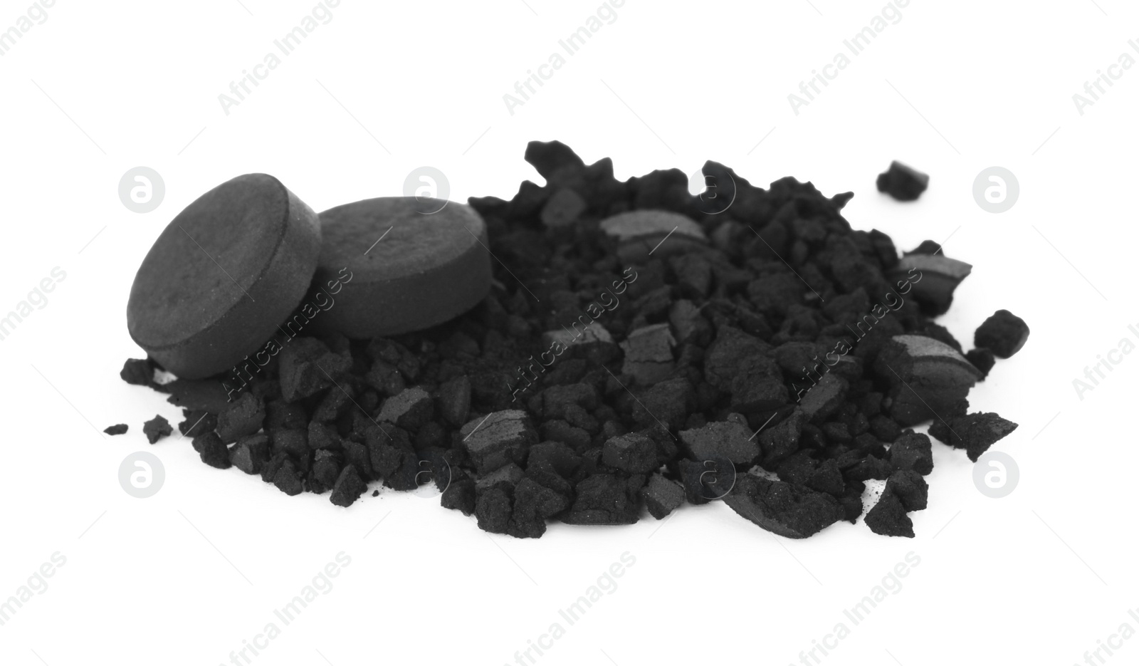 Photo of Activated charcoal on white background. Potent sorbent