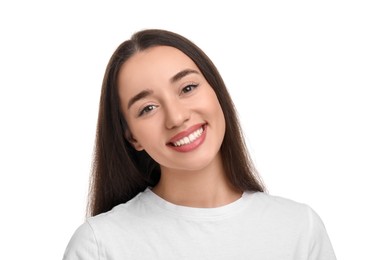Young woman with clean teeth smiling on white background