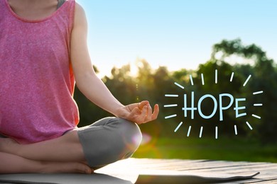 Image of Concept of hope. Young woman practicing yoga outdoors, closeup.