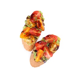 Photo of Delicious bruschettas with avocado, tomatoes and balsamic vinegar isolated on white, top view
