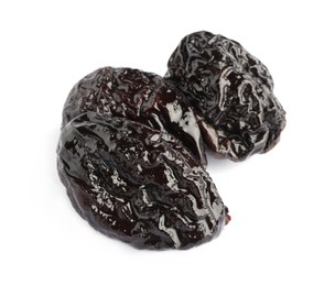 Photo of Sweet dried prunes on white background. Healthy snack