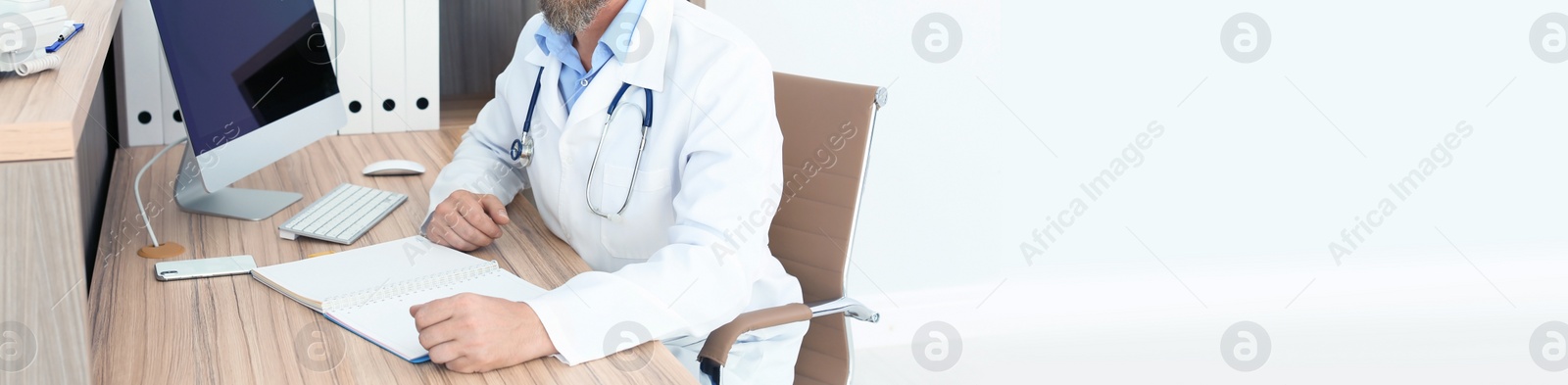 Image of Doctor in uniform at workplace in clinic, space for text. Banner design