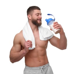 Young man with muscular body holding shaker of protein and towel on white background