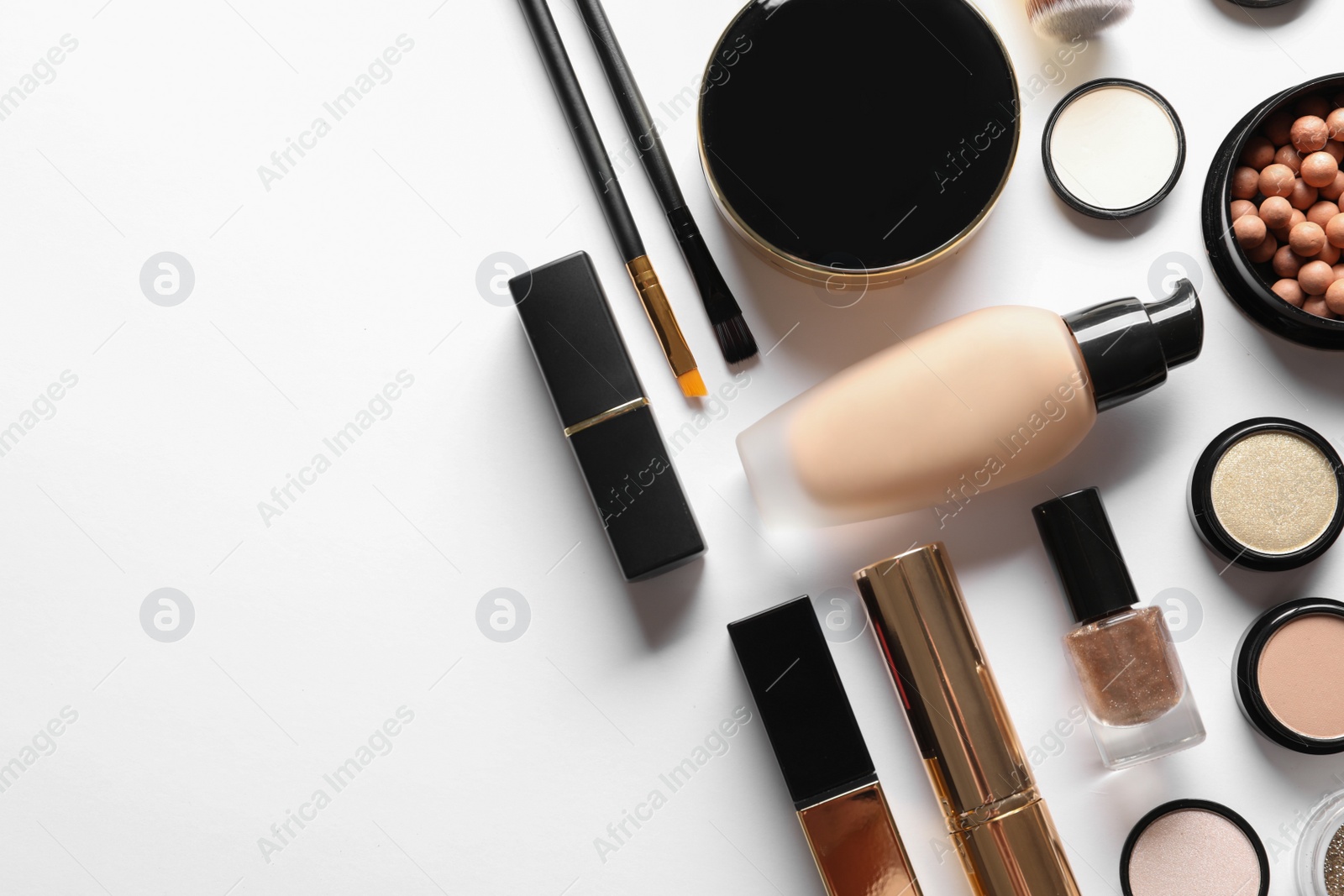 Photo of Set of luxury makeup products on white background, flat lay