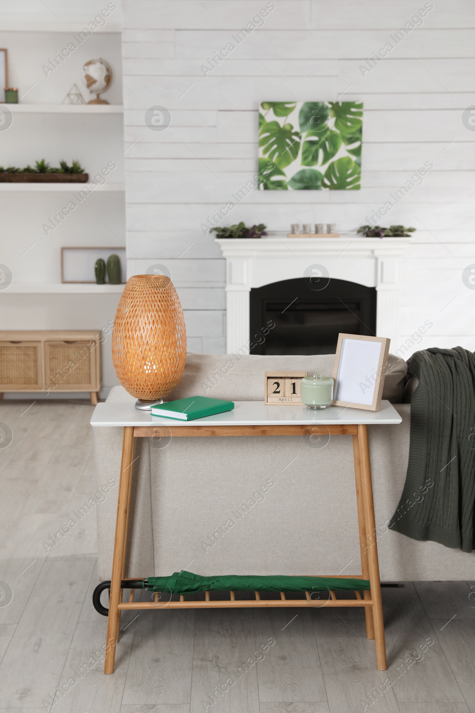 Photo of Living room interior with console table and stylish decor